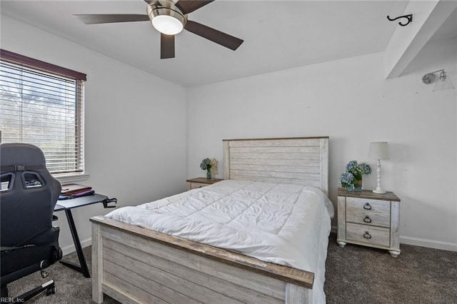 carpeted bedroom with a ceiling fan and baseboards