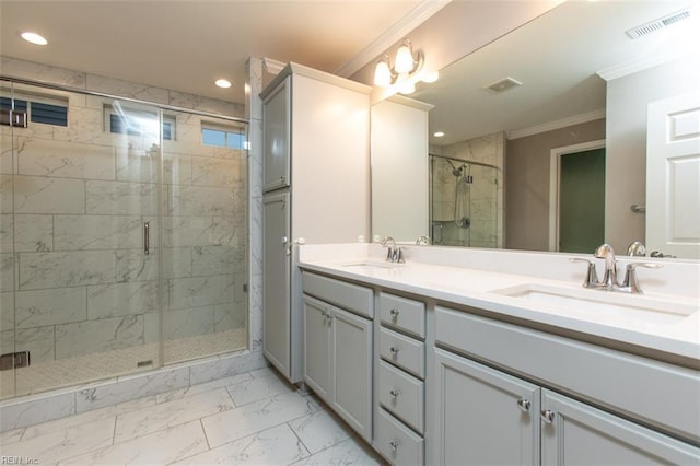 bathroom featuring visible vents, marble finish floor, crown molding, and a sink