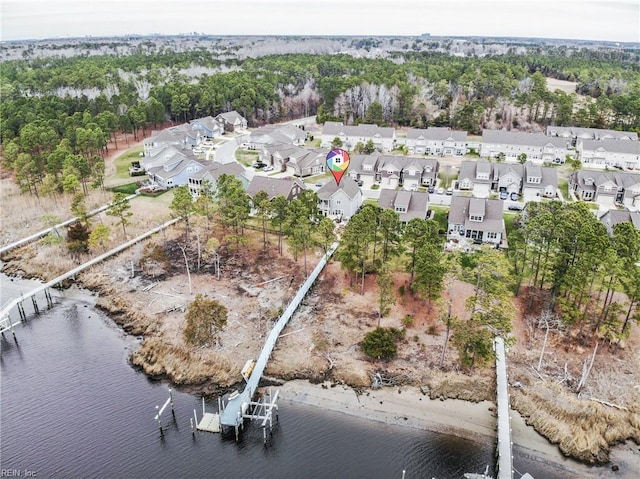 aerial view with a residential view and a water view