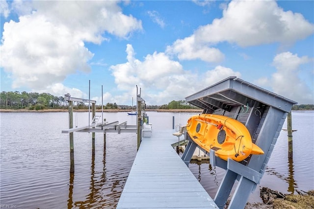 view of dock featuring a water view and boat lift