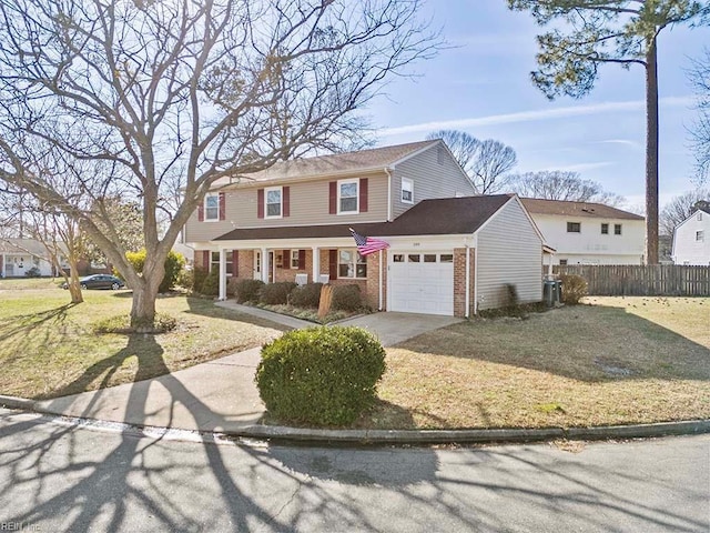 traditional-style house with central AC unit, fence, concrete driveway, a garage, and brick siding