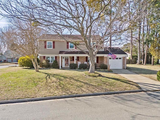 view of front of property featuring brick siding, a garage, driveway, and a front lawn