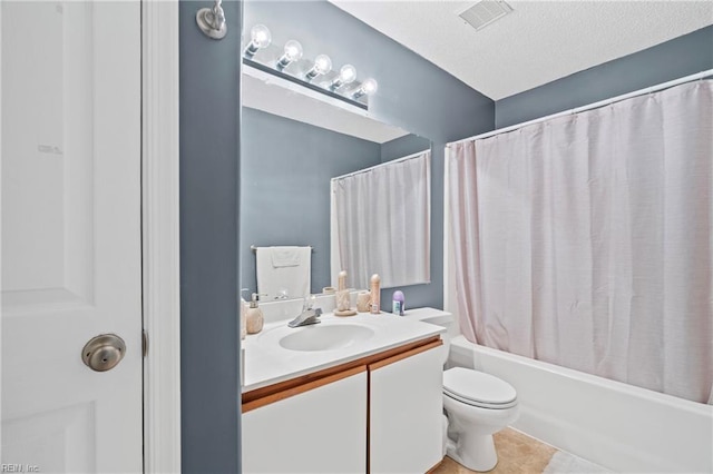 bathroom featuring visible vents, toilet, a textured ceiling, shower / bath combination with curtain, and vanity