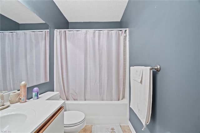 bathroom featuring a textured ceiling, toilet, vanity, and shower / bathtub combination with curtain