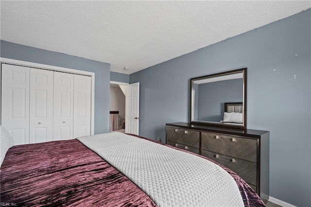 bedroom featuring a closet and a textured ceiling