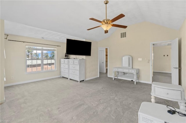 unfurnished bedroom with visible vents, baseboards, lofted ceiling, carpet flooring, and a ceiling fan