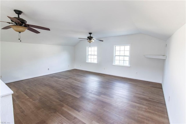 unfurnished living room featuring ceiling fan, baseboards, lofted ceiling, and dark wood-style floors