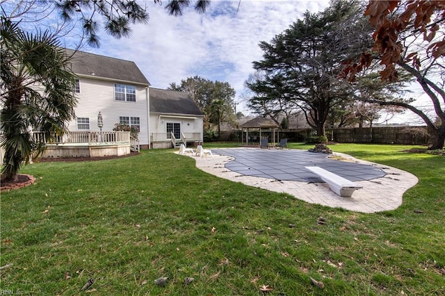 view of yard featuring a gazebo, a patio, and fence