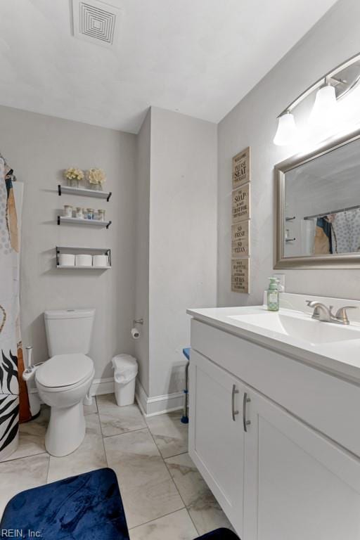 bathroom featuring vanity, visible vents, baseboards, toilet, and marble finish floor