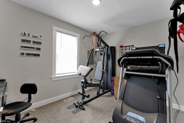 workout room with visible vents, baseboards, and carpet flooring