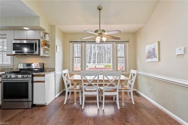 kitchen with open shelves, dark wood finished floors, white cabinetry, stainless steel appliances, and baseboards