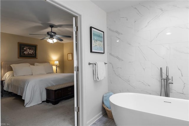 carpeted bedroom featuring a ceiling fan