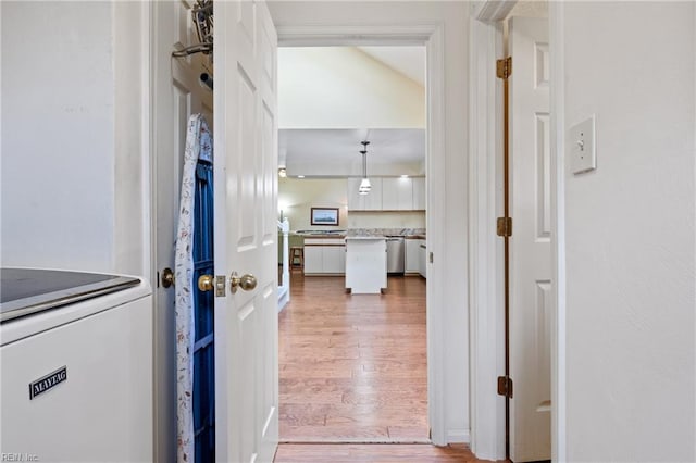 hallway with wood finished floors