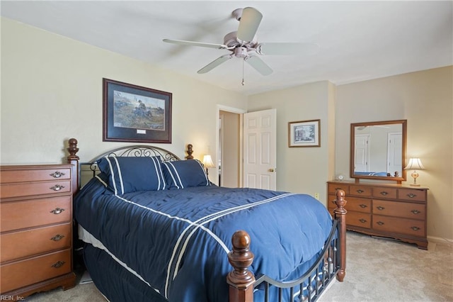 bedroom with light colored carpet and ceiling fan