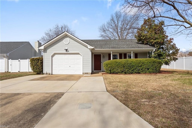 single story home with a front lawn, an attached garage, driveway, and fence