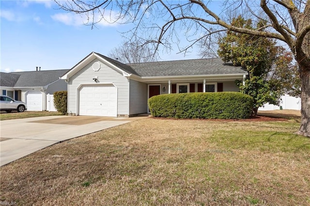 ranch-style home with a front lawn, concrete driveway, and a garage