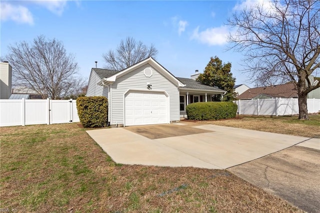 exterior space featuring a gate, driveway, and fence