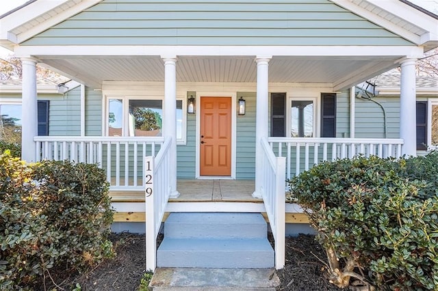 doorway to property with covered porch