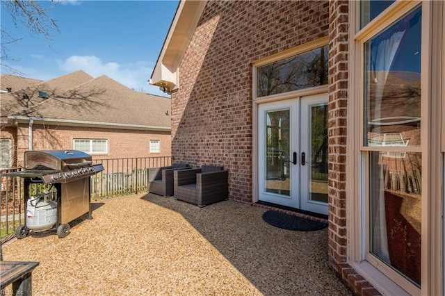 view of patio with french doors and grilling area