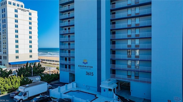 view of building exterior featuring a water view