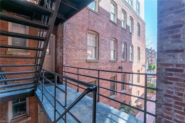 exterior space featuring brick siding