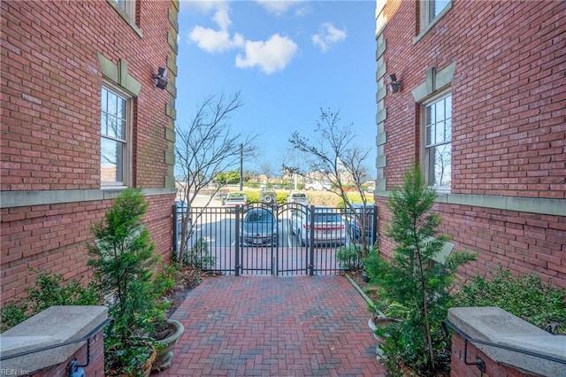 view of gate featuring fence