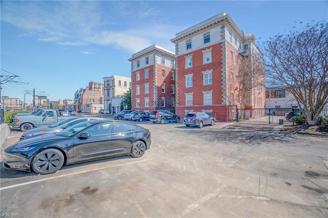 uncovered parking lot with fence