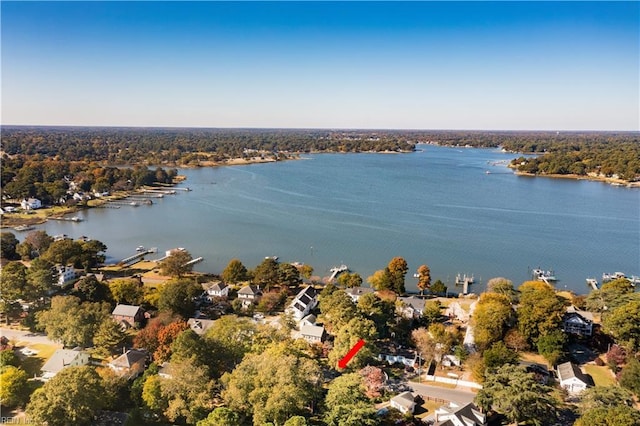 drone / aerial view with a water view