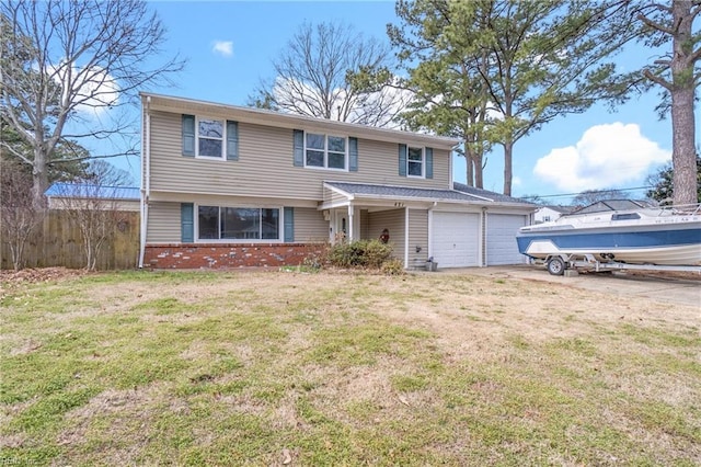 view of front of property featuring fence, concrete driveway, a front yard, an attached garage, and brick siding