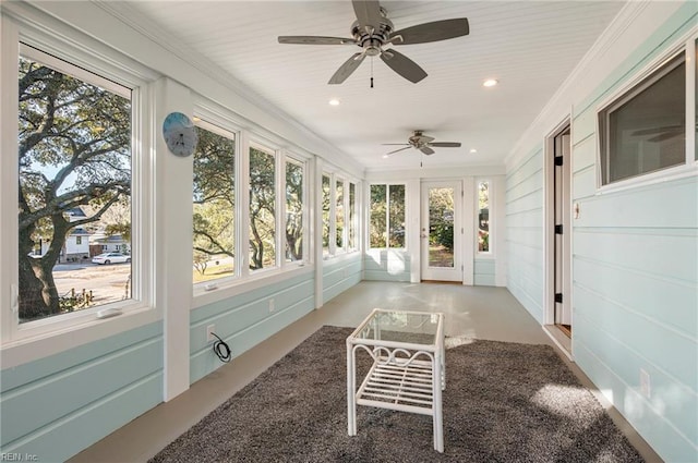 unfurnished sunroom featuring a wealth of natural light