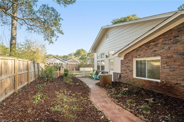 view of yard with a patio and a fenced backyard