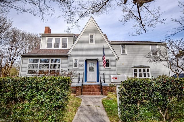 view of front of property with a chimney