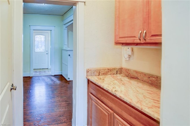 bathroom with a textured ceiling and wood finished floors