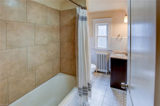 bathroom with vanity, radiator, shower / tub combo with curtain, and toilet