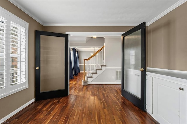 entryway featuring visible vents, dark wood-type flooring, ornamental molding, stairway, and baseboards