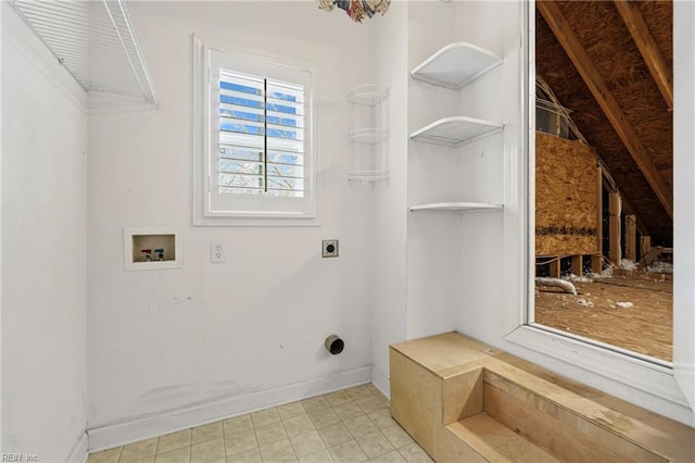 clothes washing area with laundry area, hookup for an electric dryer, baseboards, and washer hookup