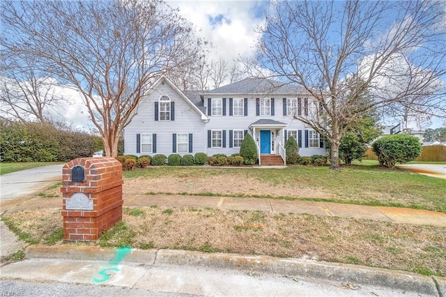 colonial house with a front yard