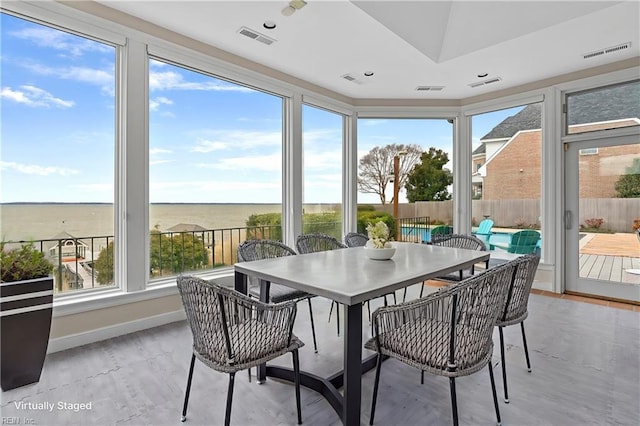 sunroom / solarium featuring visible vents