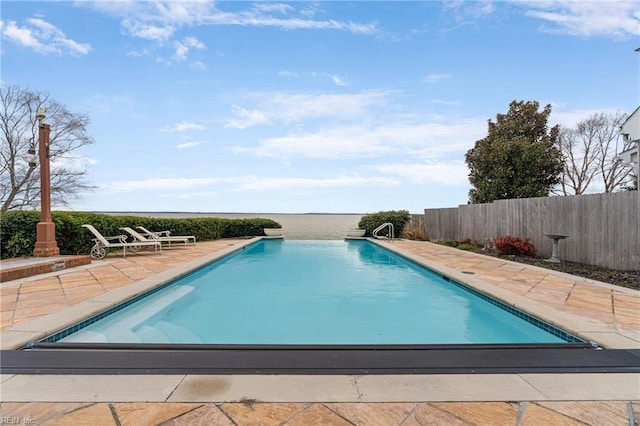 view of pool featuring a patio, fence, and a fenced in pool