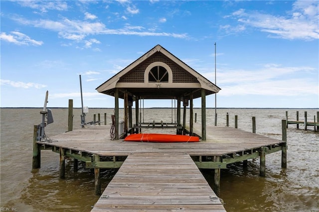 view of dock with a water view and boat lift