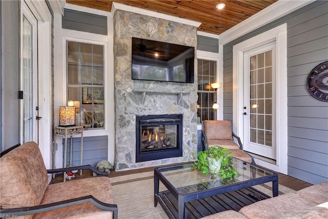 view of patio / terrace with a multi sided fireplace