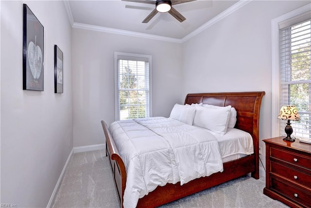 bedroom with carpet flooring, ceiling fan, crown molding, and baseboards