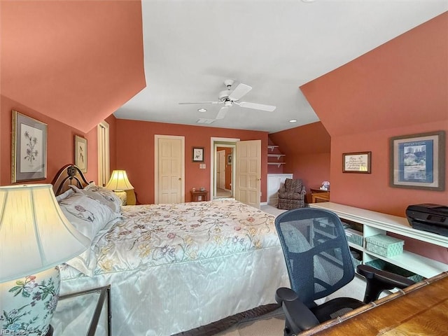 bedroom with vaulted ceiling, visible vents, a closet, and ceiling fan