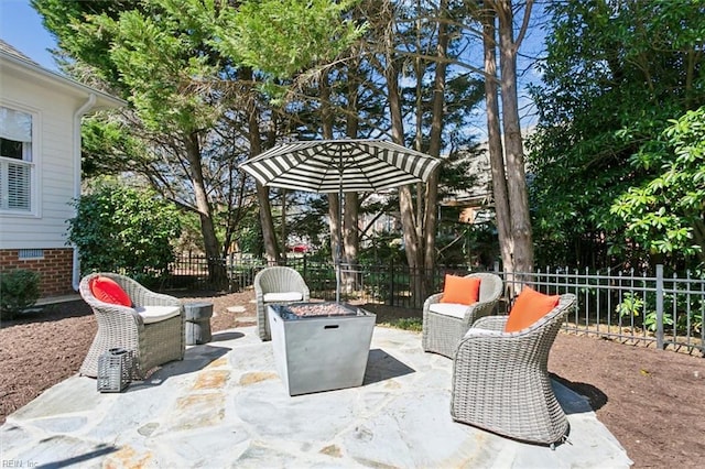 view of patio featuring fence