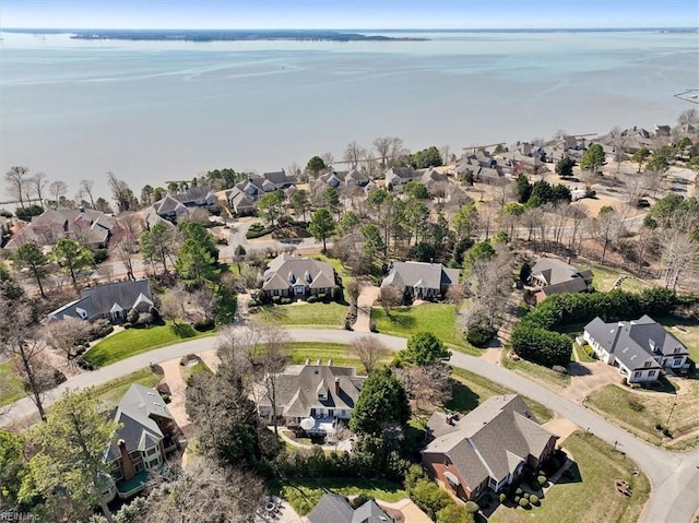 aerial view featuring a residential view and a water view