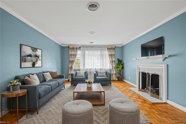 living area featuring visible vents, crown molding, and baseboards