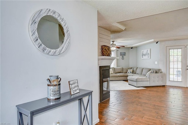 interior space featuring hardwood / wood-style floors and a textured ceiling