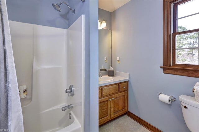 full bath with vanity, toilet, baseboards, and shower / tub combo with curtain