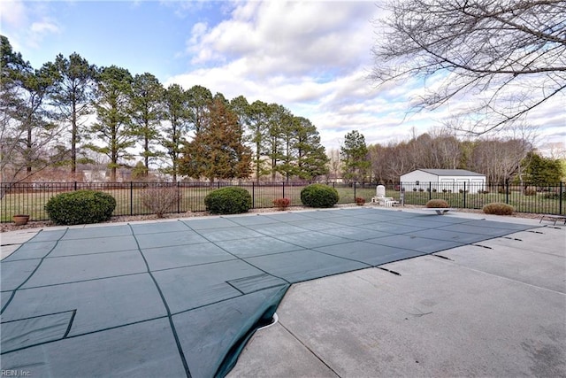 view of pool featuring a fenced in pool, a patio, and fence