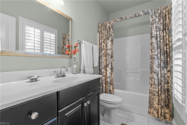 bathroom featuring vanity, tile patterned floors, toilet, and shower / bath combo with shower curtain